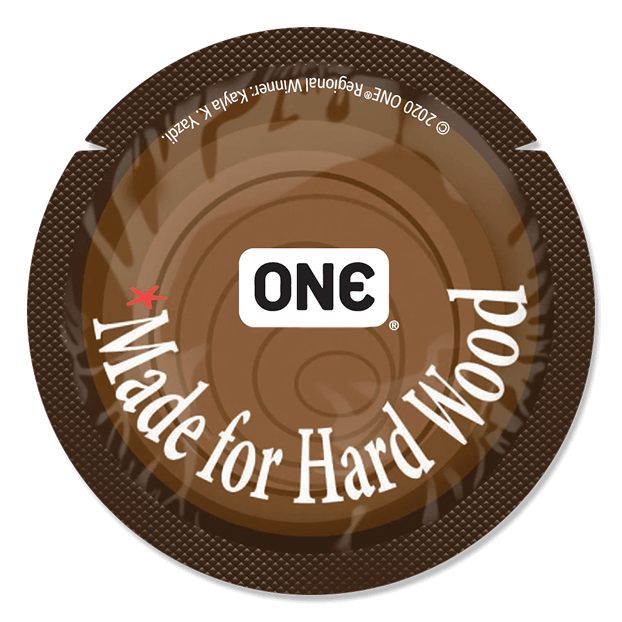 Round product packaging with 'ONE' logo and 'Made for Hard Wood' text on a brown background