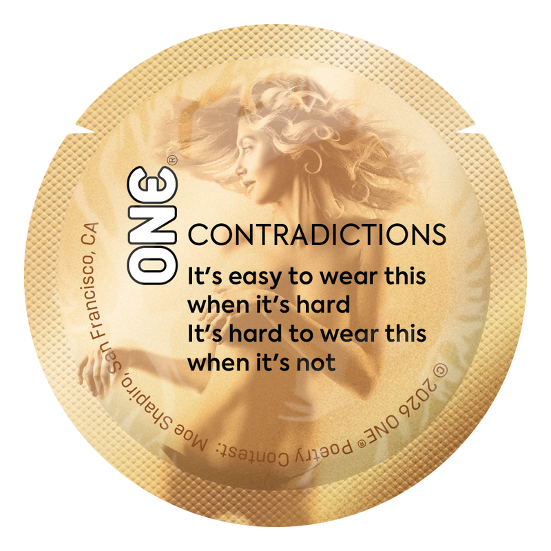 Gold condom wrapper displaying a minimalist poem exploring emotional and physical contrasts in intimacy.