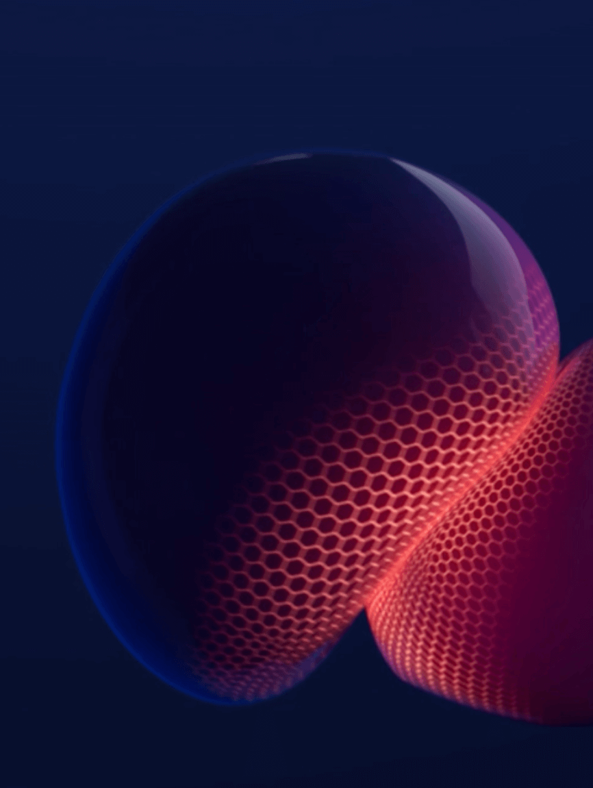 Close-up of a textured red and blue sphere on a dark background